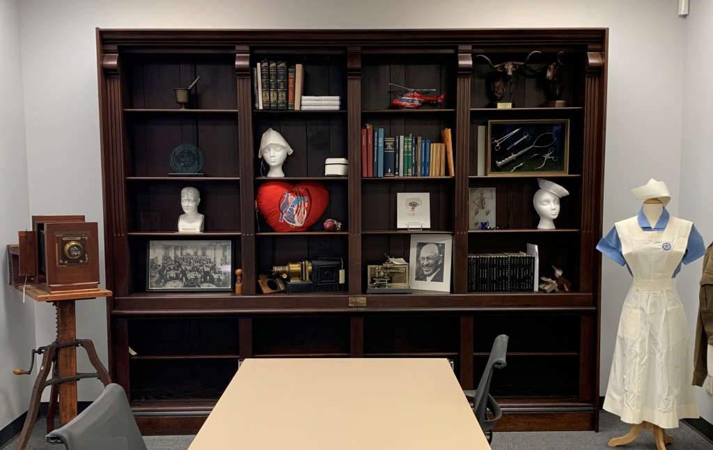 Bookshelves in the MHC Reading Room "From the Library of Oliver Wendell Holmes, M.D., 296 Beacon Street, Boston, Massachusetts." 